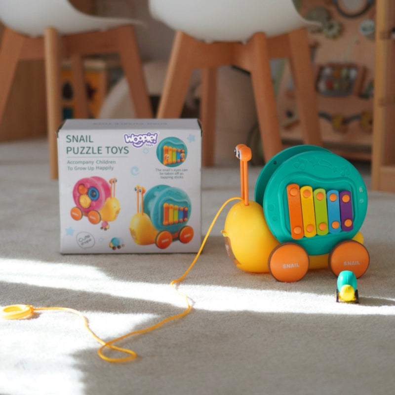 WOOPIE Pulling Snail 4in1 cymbaler Sensory Gears Launcher + liten bil