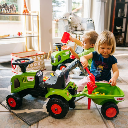 FALK Baby Claas Traktor Grön med Trailer + tillbehör. från 1 år